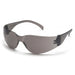 "Full-coverage gray safety glasses with black frost frame for eye protection, conforming to ANSI Z87.1 and CSA Z94.3 standards."