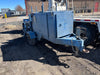 "Used Reed M20 pump with mixing hopper attachment, 3,605 hours."
