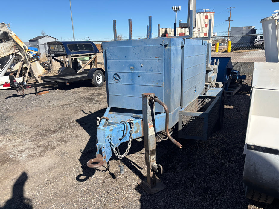 "Used Reed M20 pump with mixing hopper attachment, 3,605 hours."
