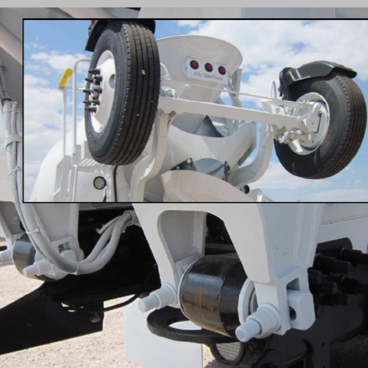 Close-up of a cement mixer truck tire assembly highlighting the robust wheel and mechanical parts